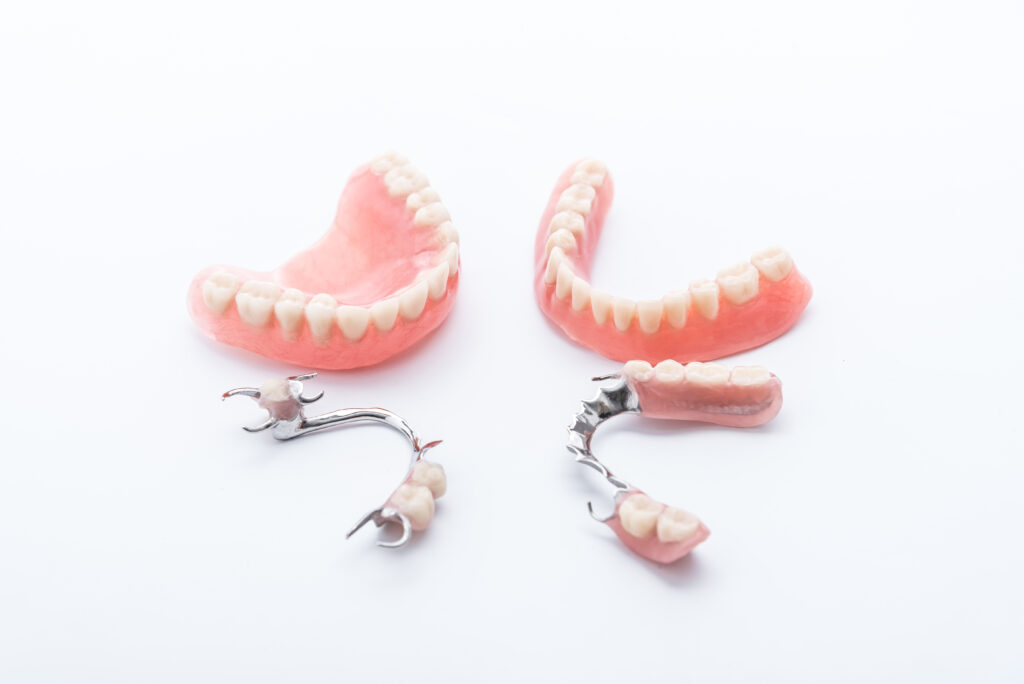 Full & Partial 1 Set of dentures on white background